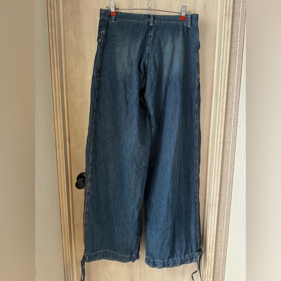 Free People Lotus High Waist Tie Hem
Barrel Leg Jeans - Picture 8 of 10